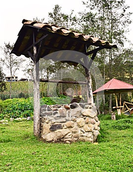 Old water well in the garden