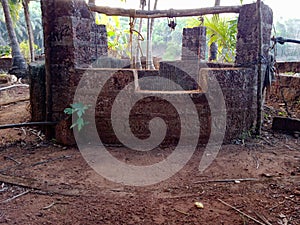 Old water well with pulley.