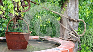 Old water well With Pulley and Bucket