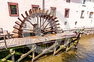 Old water wheel on Certovka river in Prague, Czech Republic