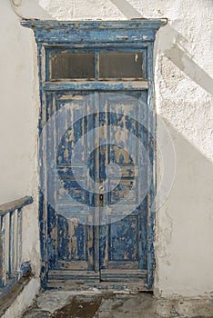 Old waterfront house door Mykonos Town Greece