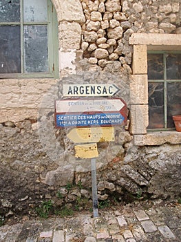 Old waymarker in French village