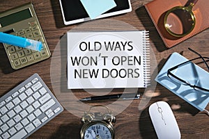 Old ways won`t open new doors on notepad. Motivational quote