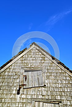 Old weather beaten Fisherman and lobsterman shack on the Maine C photo