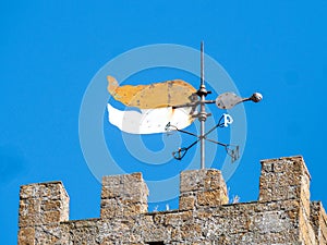 Old weathercock in Volterra, Italy