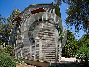 Old weathered abandoned wooden house