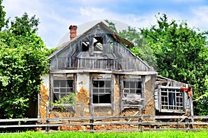 Old and weathered adobe traditional house.