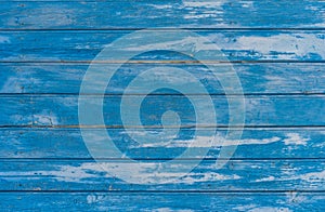 Old weathered blue colored wood wall background texture