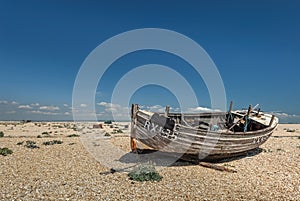 old weathered boat on Dungeness shingle beach