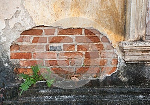 Old weathered brick wall fragment