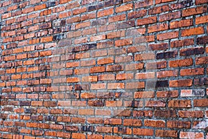 Old weathered bricks wall, perspective view