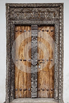 Old weathered carved traditional zanzibarian door