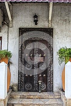 Old weathered carved traditional zanzibarian door