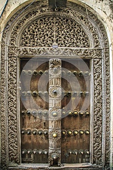 Old weathered carved traditional zanzibarian door