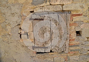 Old weathered closed wooden window