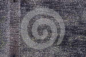 Old dark tar paper texture background