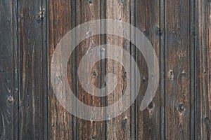 Old weathered distressed wooden boarding wood texture background