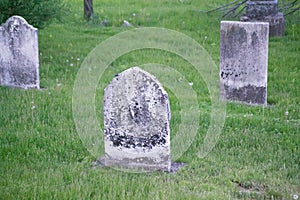 Old Weathered Headstones In Cemetery