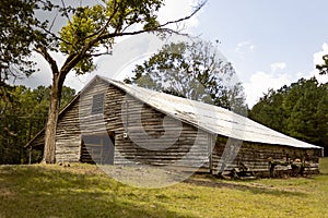 Old weathered horse barn in the country.