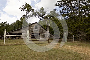 Old weathered horse barn in the country.
