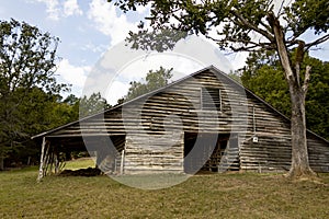 Old weathered horse barn in the country.