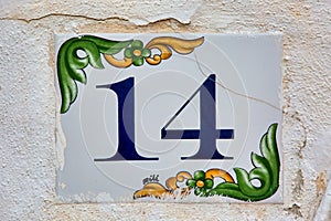 Old Weathered House Number 14, Tile on Wall photo