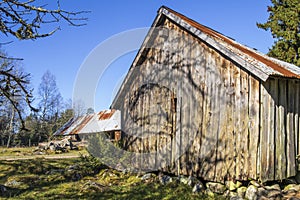 Old weathered houses on a farm