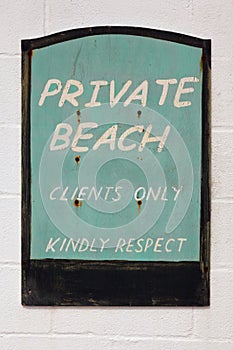 Old weathered Private beach sign