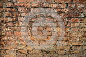 Old weathered red Brick wall
