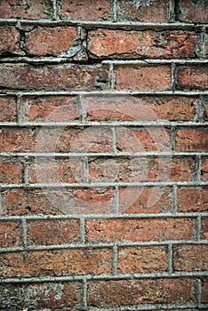 Old weathered red Brick wall