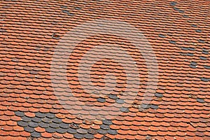 Old weathered red brown ceramic roof tiles