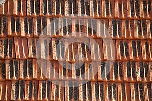 Old weathered red roof tile surface texture