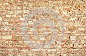 Old weathered red wall of brick