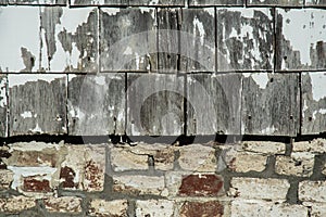 Old weathered shingles and brick for background