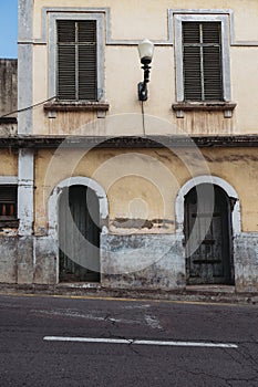 Old weathered timeworn shabby house front in Funchal, Madeira photo