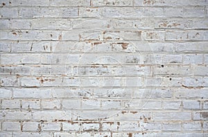 Old weathered white brick wall