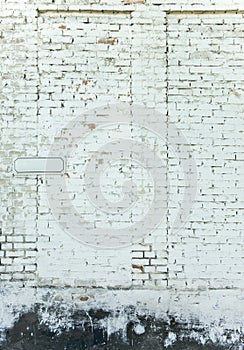 Old weathered white brick wall