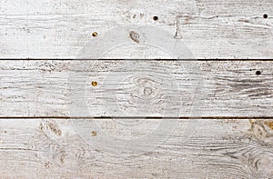 Old weathered white gray wood planks background texture