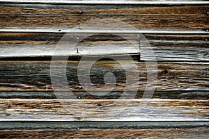 Old Weathered Wood of a Barn with Rusty Nails photo