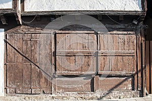 Old weathered wooden window shutters