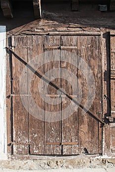 Old weathered wooden window shutters