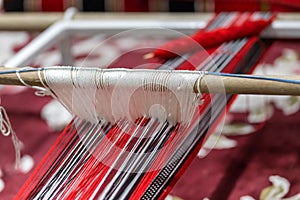 An old weaving machine, closeup view photo