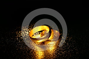 Old wedding rings, water effect