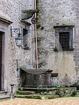 Old well within the Bracciano Castle , also known as Castello Orsini - Odescalchi . ROME