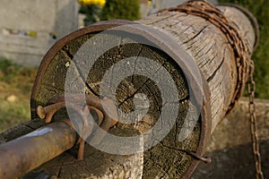 Old well, bucket and string.
