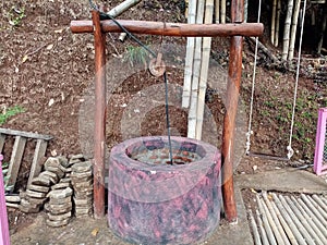 Old well. Describes the traditional life of native Indonesians. photo