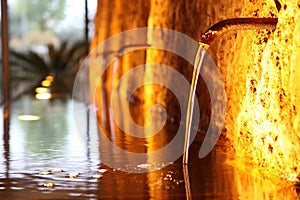 Old well at night, lit atmospherically