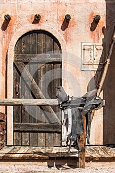 Old west cantina with saddle photo