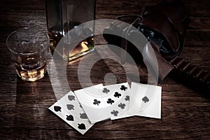 Old west poker. Dead man`s hand. Two-pair poker hand consisting of the black aces and black eights, held by Old West gunfighter photo