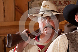 Old west trapper with pipe photo